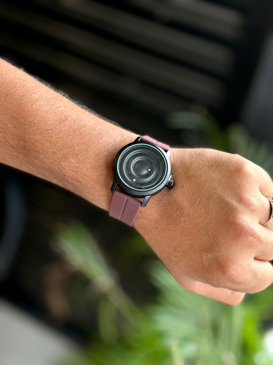 Magnetic spinning watch